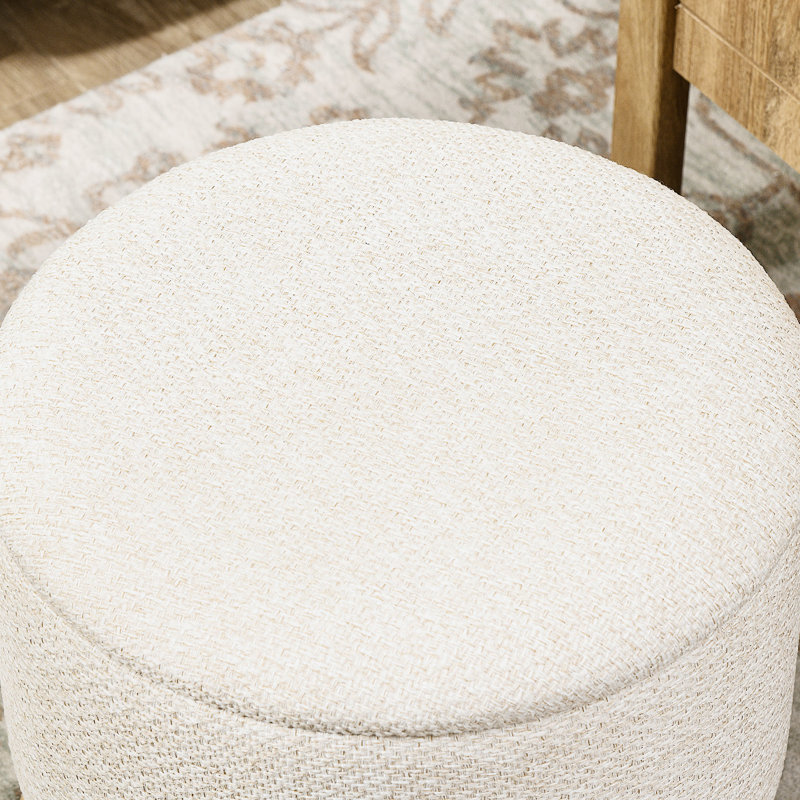Fauteuil rembourré blanc crème - Rangement dissimulé pour vos besoins. Assise confortable et polyvalente. Stable grâce à sa base antidérapante. Compartiment de rangement pour vos essentiels. Convient à différentes pièces. Pieds.