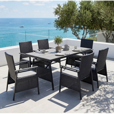 Ensemble de salle à manger d'extérieur 7 pièces en aluminium résistant aux intempéries avec table WPC de 160 cm, 6 chaises de salle à manger en rotin PE et coussins