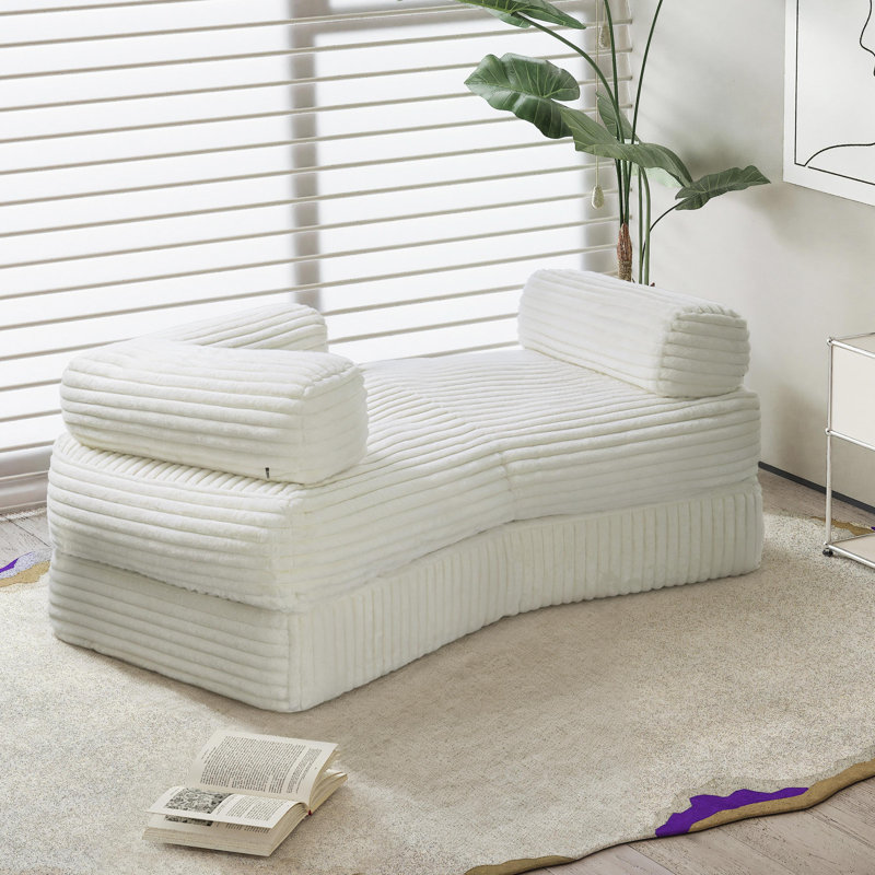 Chaise longue rayée en fausse fourrure de lapin