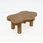 Table basse moderne en forme de nuage avec pieds ronds robustes