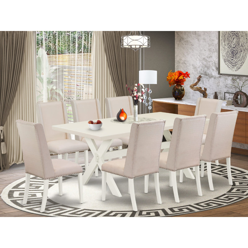 Ensemble de table de salle à manger 9 pièces comprenant une table de cuisine rectangulaire avec pieds en X et 8 chaises de salle à manger Parson en tissu crème, lin blanc