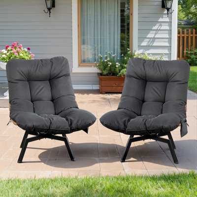 Chaise pivotante d'extérieur en osier avec coussins