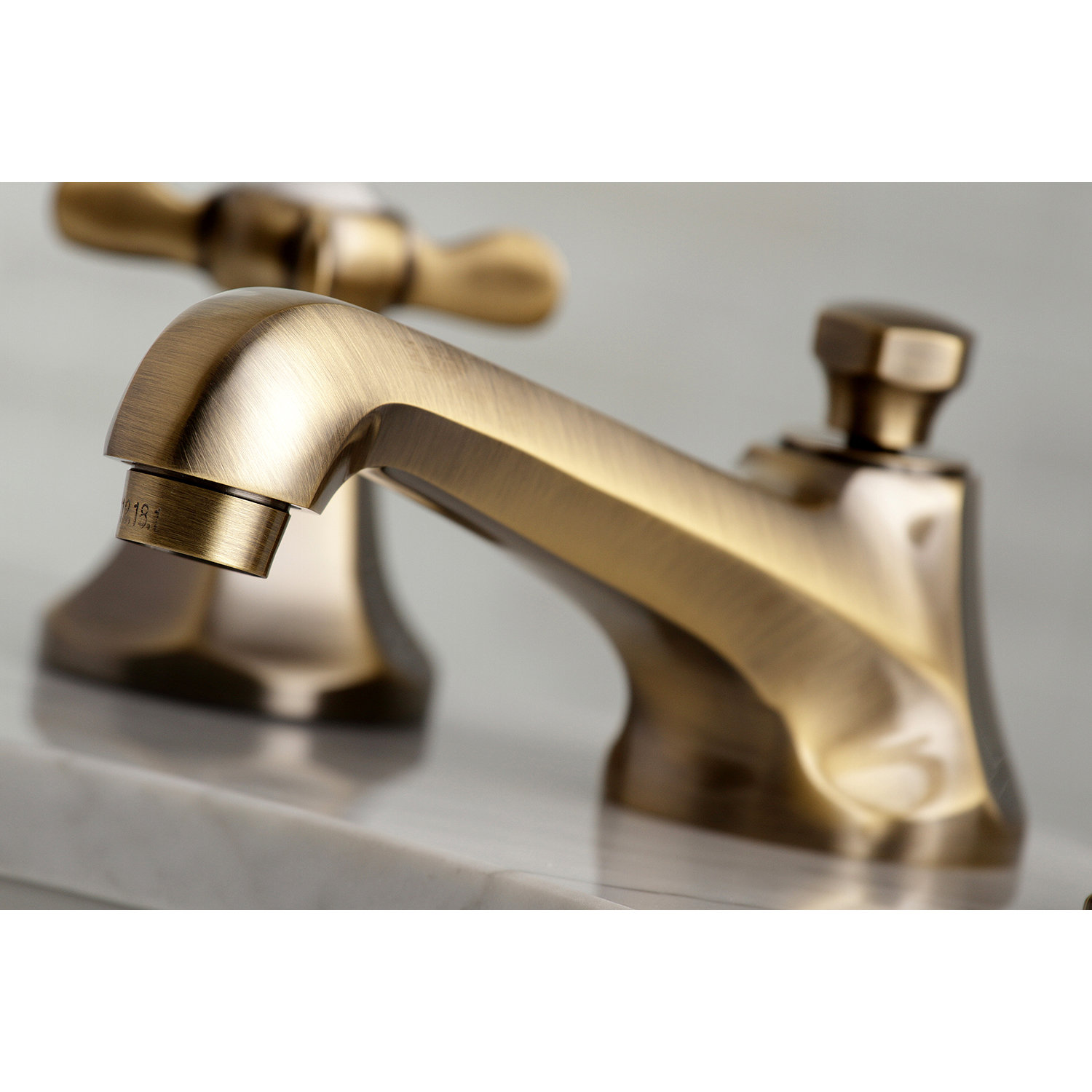 Kingston Brass Essex Two-Handle 3-Hole Deck Mount Widespread Bathroom Faucet with Brass Pop-Up Drain, Vintage Brass
