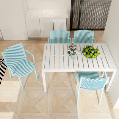 4Pcs Stackable PP Armchair For Indoor/Outdoor Use – Ergonomic Slatted Back With 55 Inch White Modern Long Table - Indoor/Outdoor- Lightweight PP Tabletop With Metal