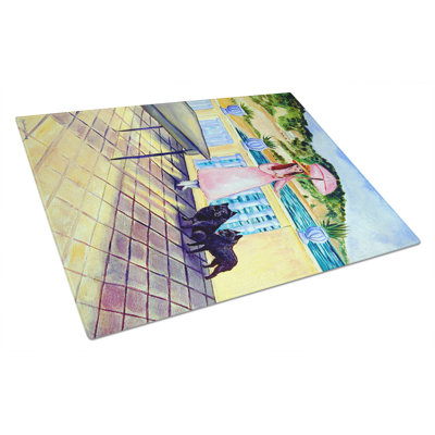 Caroline's Treasures Lady with Her Schipperke Glass Cutting Board