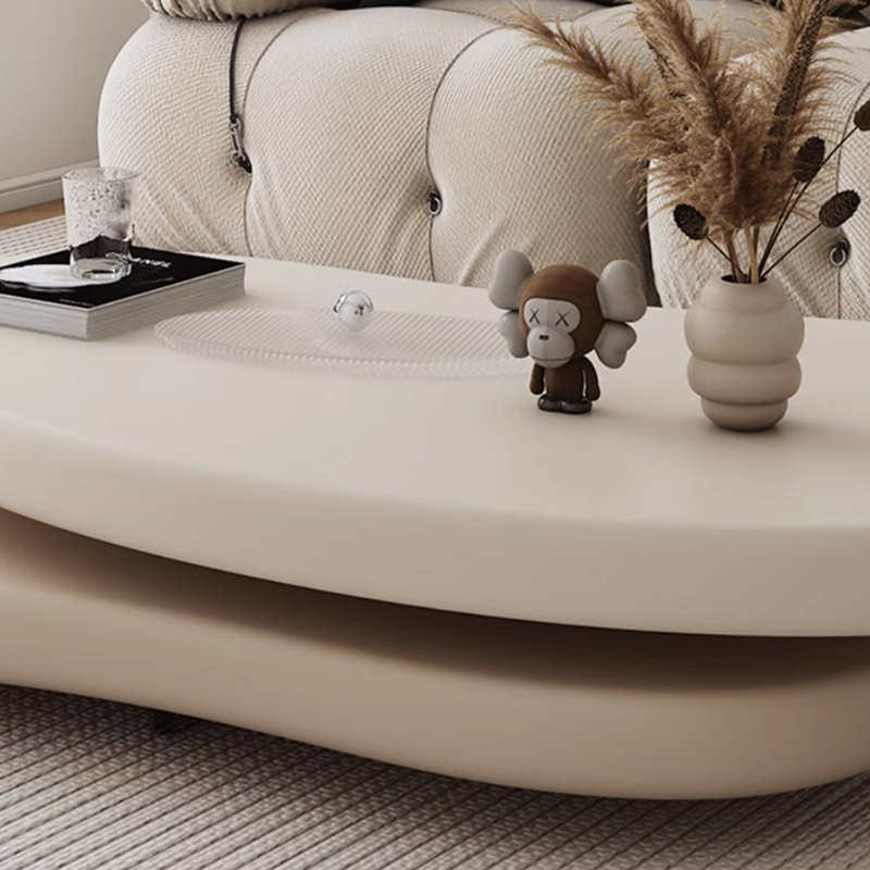 Orren Ellis Tamirra Cream Coffee Table