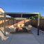 Pergola en aluminium à persiennes grise pour l'extérieur