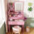 23.6" Pink Vanity Set with LED Mirror & Stool | Dressing Table with 2 Drawers & 5 Storage Cabinets (4 Open + 1 Hidden) | Adjustable 3‑Color Lighting, Built‑In Charging Station | Compact Space‑Saving Makeup Desk-964638797