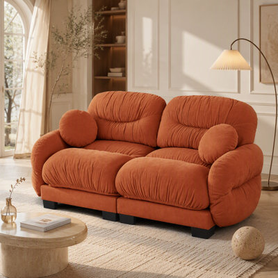 Pleated Chenille 2-Seater Modular Sofa with Ergonomic High-Density Foam, Curved Armrests, and Two Round Throw Pillows.