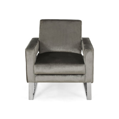 Fauteuil club, accoudoirs découpés, acier chromé et velours gris moderne