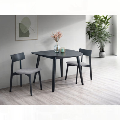 Ensemble repas compact trois pièces avec table et chaises rembourrées