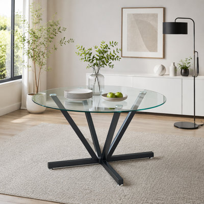 Table de salle à manger ronde en verre trempé avec pieds en métal noir