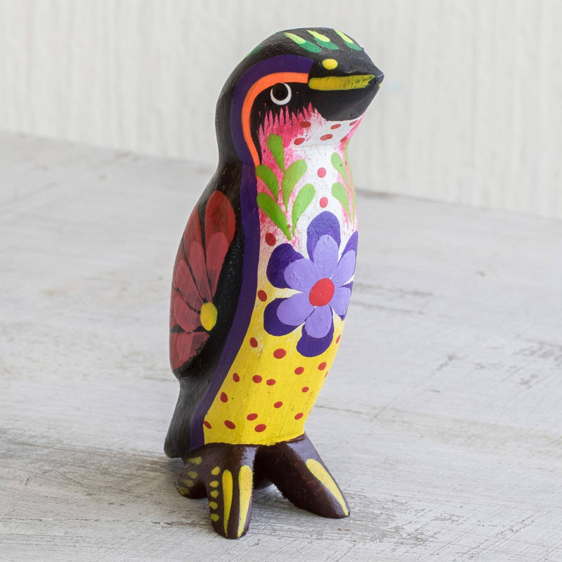 Figurine pingouin et bois