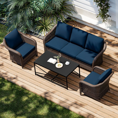 Ensemble de causeuse d'extérieur en osier pour 6 personnes avec chaise pivotante, table d'appoint et repose-pieds Alderwood