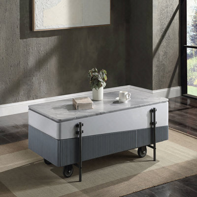 Table basse grise et blanche avec plateau relevable