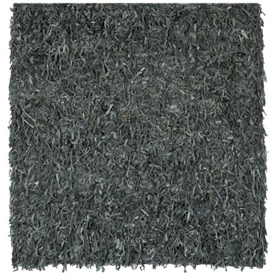 Godsey Handwoven Leather Solid Color Rug