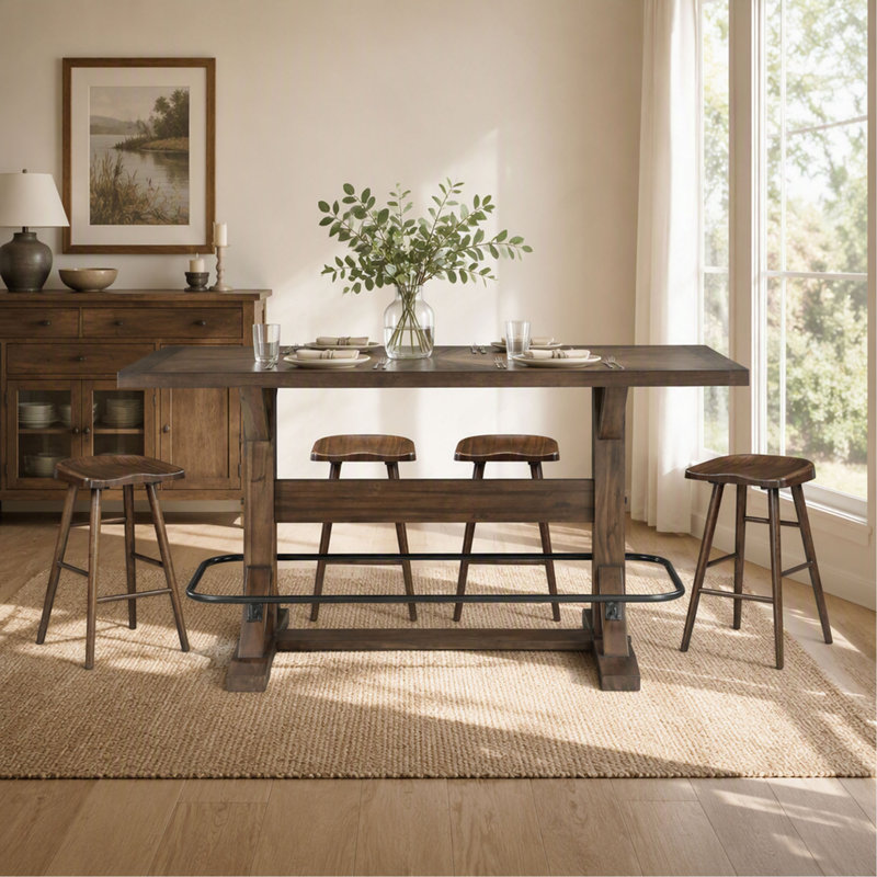 Ensemble de salle à manger de style pub, 5 pièces, fini brun, comprenant une table, un repose-pieds en métal et 4 tabourets sur une structure en bois robuste.