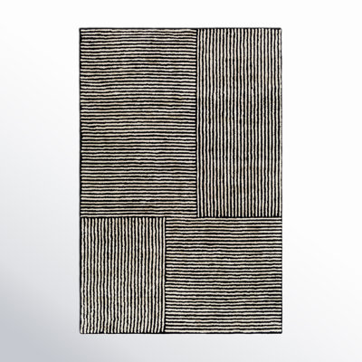 Balos Hand Tufted Black/Ivory Rug