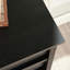 Commode 4 tiroirs en bois avec design d'espace de travail, noir