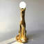 Lampe sur pied avec sculpture de panthère dorée 55,1 po