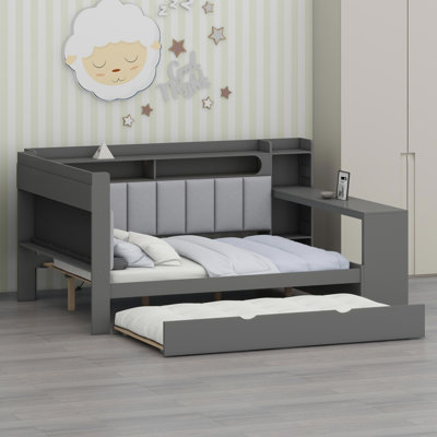 Structure de lit de jour tout-en-un avec bureau d'étude, lit gigogne sous le lit, tablettes organisées, solutions Smart Power, éclairage dynamique et appui-tête ergonomique Soft-Touch