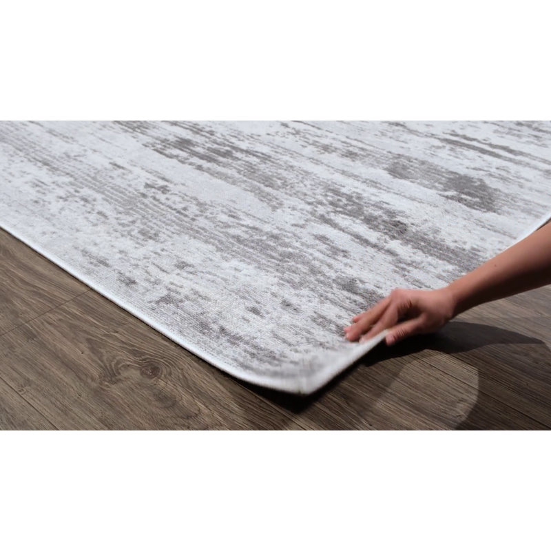 Gray and Ivory Abstract Medium Pile Synthetic Rectangle Rug 2' x 3'