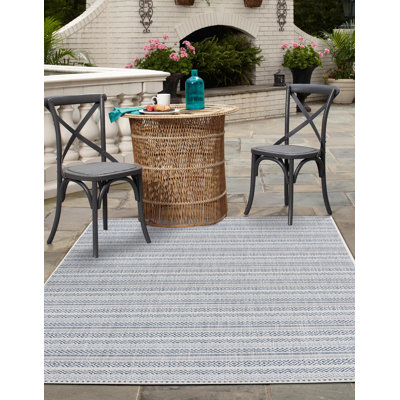 Tapis intérieur / extérieur en polypropylène tissé à la machine Evolet