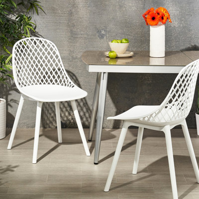 Chaises de salle à manger d'extérieur en blanc - matériau en polypropylène, structure stable et polypropylène de style maille diamant