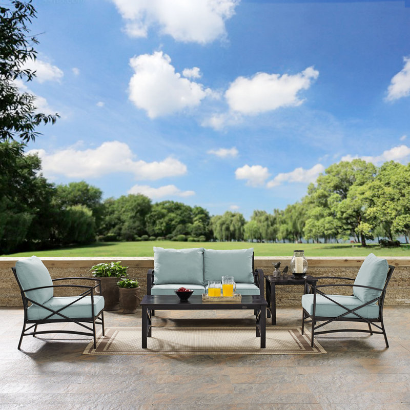 Mosier 4 - Person Patio Conversation Set with Cushions, Mist, Oiled Bronze