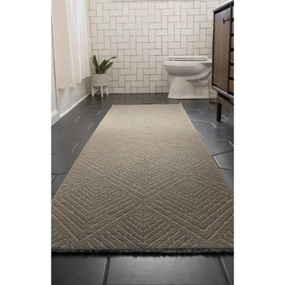Tapis brun lavable à la machine Breneisha