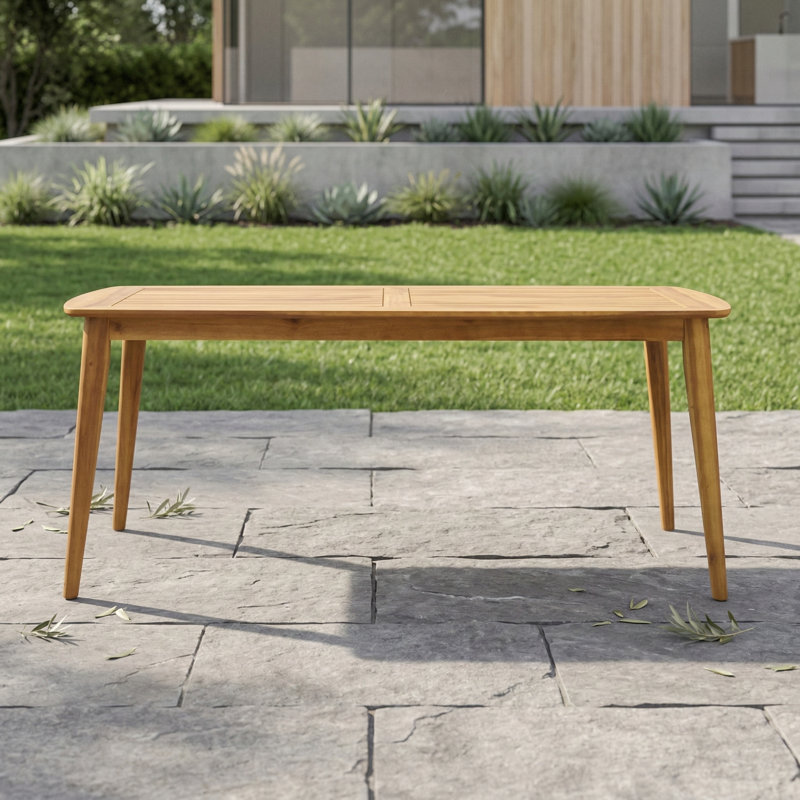 Table de salle à manger d'extérieur fabriquée avec une structure en bois d'acacia. Finition en teck.