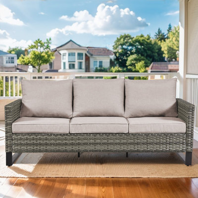Outdoor Brooksie Swivel Gliding Wicker Chair with Cushions