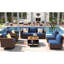8 chaises d'extérieur avec chaises pivotantes, sièges profonds, table, coussins bleus, bascule bleue, fondu