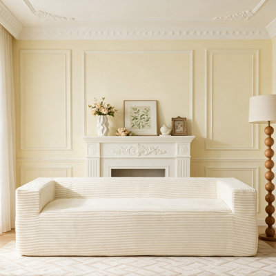 Canapé moderne sans os de 234 cm de large, en velours côtelé comprimé, avec porte-gobelets et rangement.