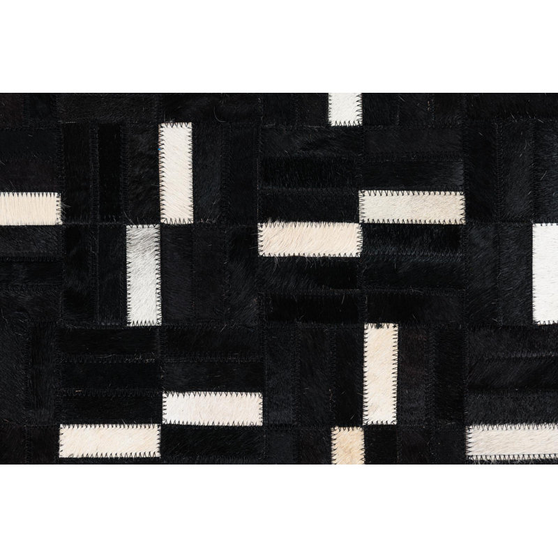 Tapis noir Orlowski