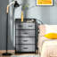 Commode à 5 tiroirs grise pour chambre à coucher et vestibule avec structure en acier, tiroirs pliables, commode de fondation stable à 5 tiroirs