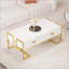 Table basse moderne blanche moderne avec 4 tiroirs spacieux et une base dorée élégante, parfaite pour les espaces de vie contemporains.-102435895