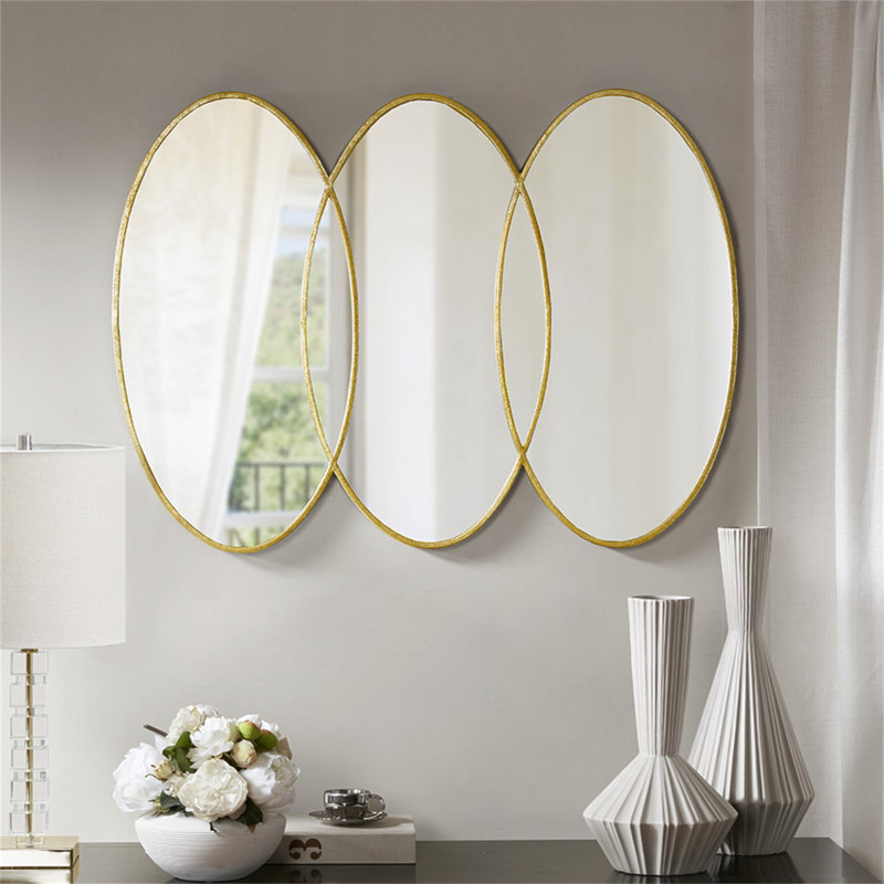Miroir mural doré