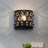 Contemporary Matte Black Wall Sconce With Glass Droplets And Ellipse Cutouts For Pathways And Entryways Stylish Decorative Wall Lighting For Bed Side