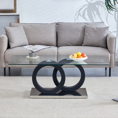 Table basse de style moderne avec plateau en verre