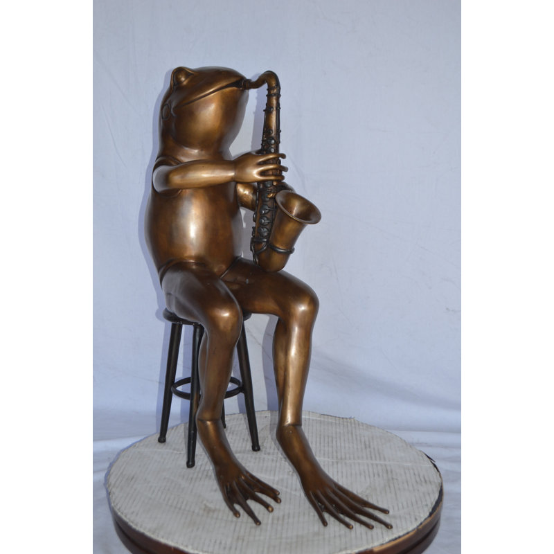 Frog playing saxophone bronze statue - Size: 23"L x 15"W x 30"H.