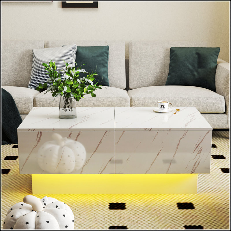 Table basse moderne extensible avec plateau coulissant et rangement caché, parfaite pour les salons organisés