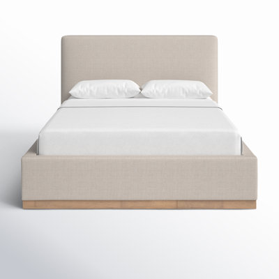 Delpha Grounded Upholstered Wood Base Bed