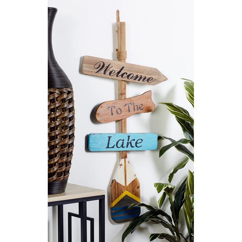 Décoration murale multicolore en bois avec rame et aviron