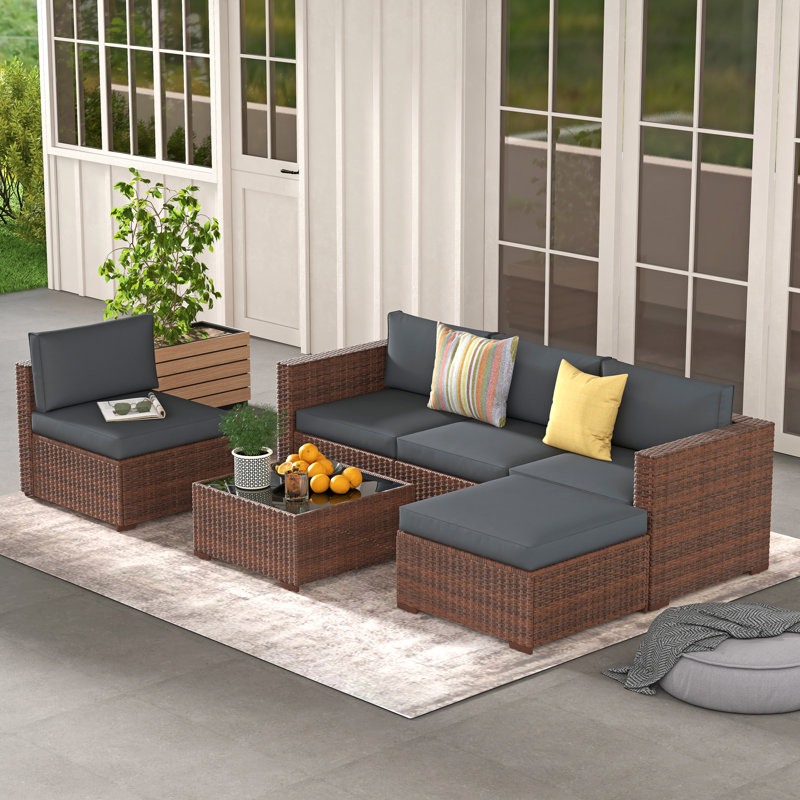 Ensemble de conversation modulaire en rotin 6 pièces avec coussins Eudy, Gris / Bleu marine