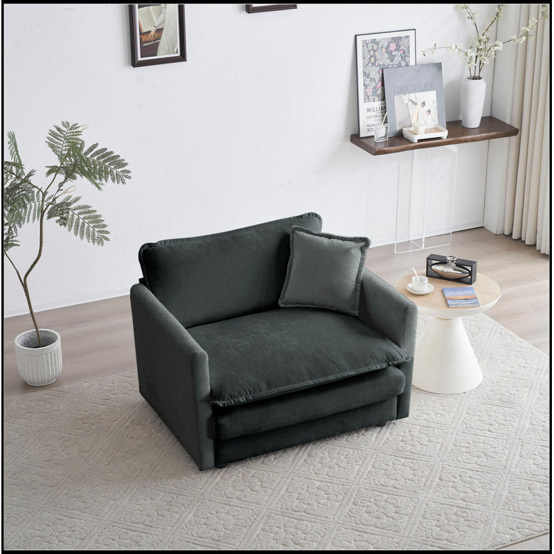 Canapé à assise simple confortable et profond avec coussin moelleux pour un salon relaxant
