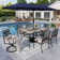 Bjartmar Rectangular 6 - Person 60'' Long Dining Set With Cushions And Umbrella
