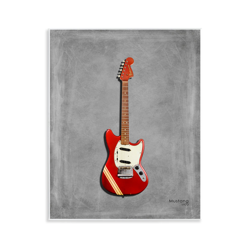 Guitare rouge sur plaque murale grise, design par Mark Rogan