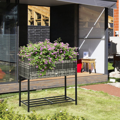 Boîte de jardin surélevée grise, design pour herbes, légumes, fleurs, avec porte-outil original, rangement dans un arrangement floral, maîtrise