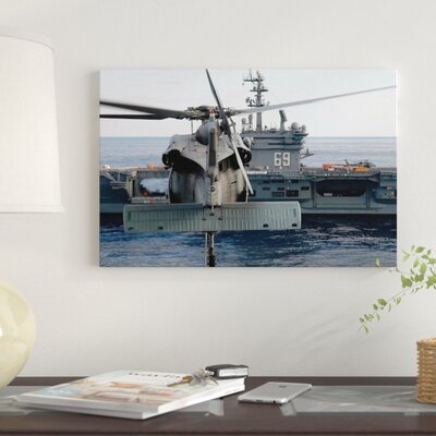 An MH-60S Seahawk Hovers Prior to Taking a Load of Ammunition to USS Dwight D. Eisenhower' Photographic Print on Canvas -  East Urban Home, D1AD5A2F8A1C470CA80811F42BFBED34